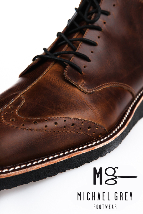 Genuine leather boots, half wingtip, welt/ laser etched details, on crepe sole 