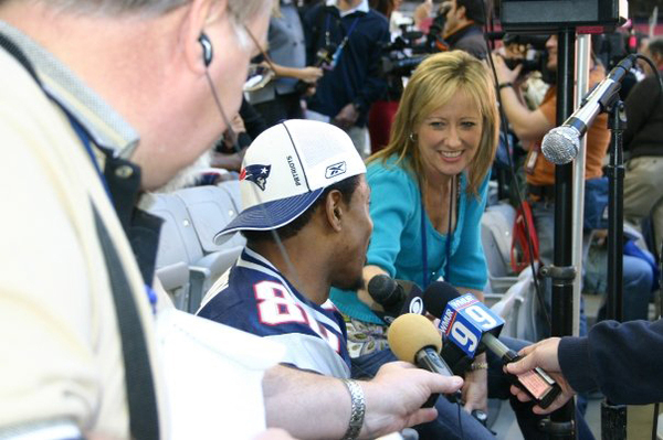 Alice Cook with Troy Brown at the Super Bowl.