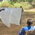 Training volunteers to install bed-nets