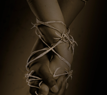 20130502155520-bound_hands_close